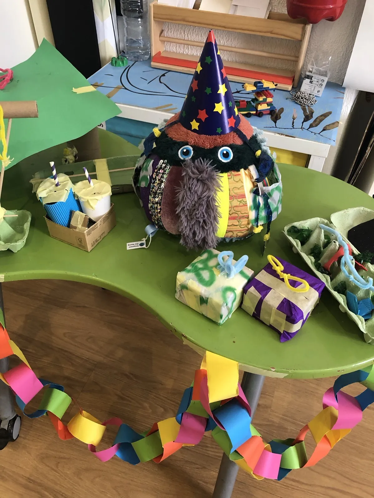 Dotty wearing a party hat at the welcome party